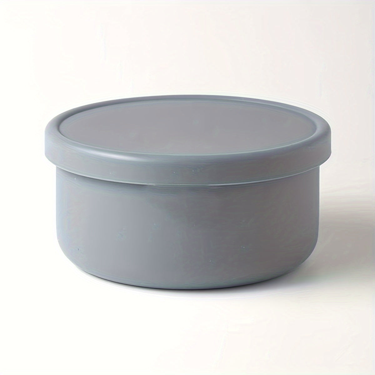 Multi-functional Storage Container made of Silicone - Does not contain BPA, can be used in the Microwave and Freezer. Ideal for storing Fruits, Vegetables, and Lunch items. Circular Kitchen Container with a convenient Flip-Top Cover.