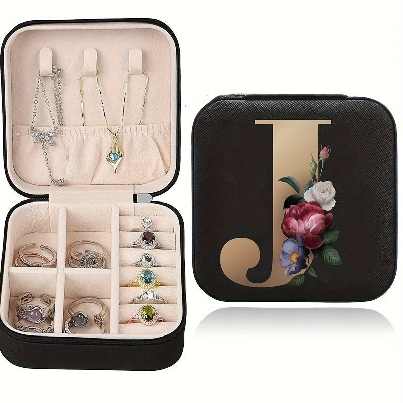 Floral initial jewelry organizer box with compact design, soft velvet lining, durable zipper, and lightweight, ideal for jewelry organization and travel.