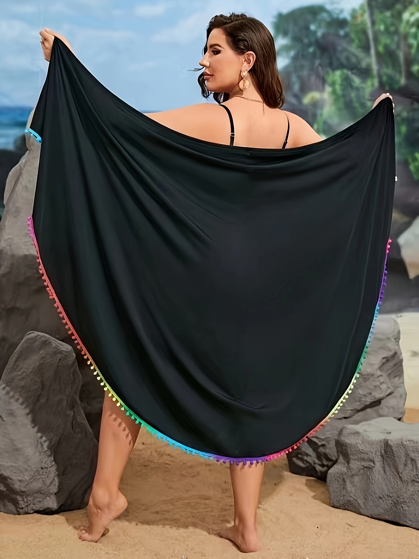 Boho chic black kimono-style beach cover-up with colorful fringe detail - made from lightweight, stretchy polyester blend and machine washable. Suitable for all seasons and beach