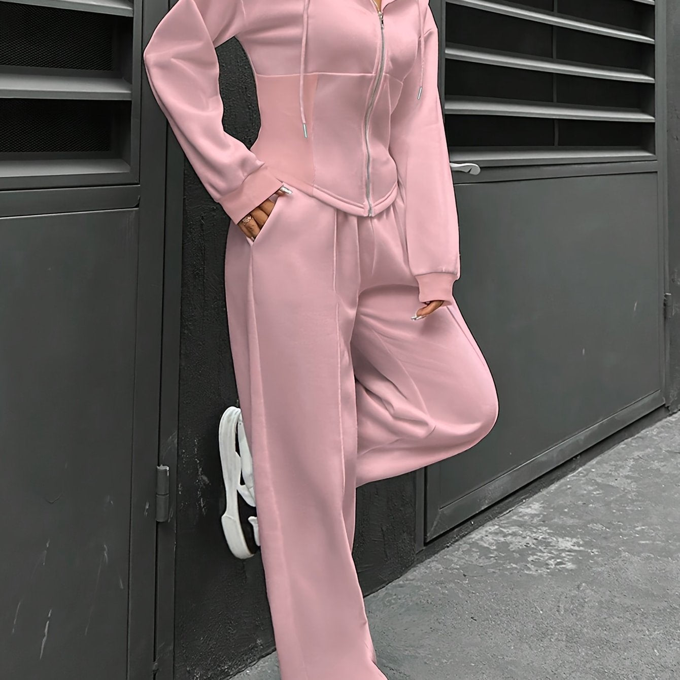 Stylish polyester tracksuit set with hood, drawstring, and zipper details – versatile knit pantsuit for all seasons