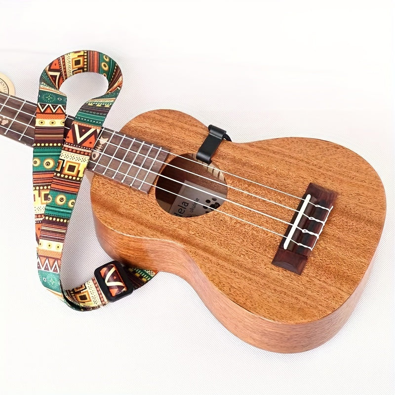 Colorful Hawaiian-inspired ukulele strap with geometric patterns, vibrant mixed colors, and a 4-string guitar hook backdrop.