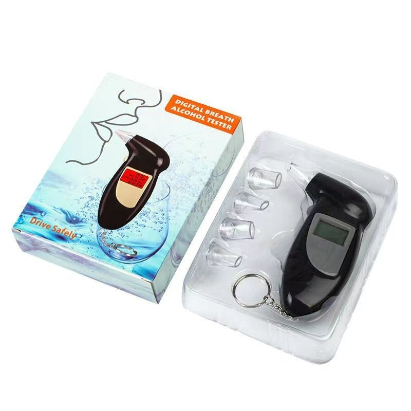 Portable digital breathalyzer with LCD display, high-accuracy BAC detector, and keychain. Requires batteries.