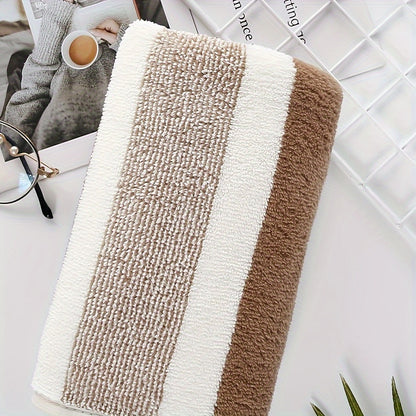 Soft and absorbent rectangular towel with Bohemian braided stripes and music theme, perfect for daily use.