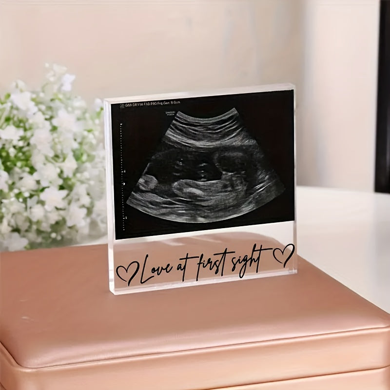 Display your ultrasound photos in style with our Acrylic Ultrasound Photo Tent Card. Featuring a high-gloss finish and the charming "Love at First Sight" script, this is the perfect gift for Father's Day, pregnancy announcements, and new parents. This