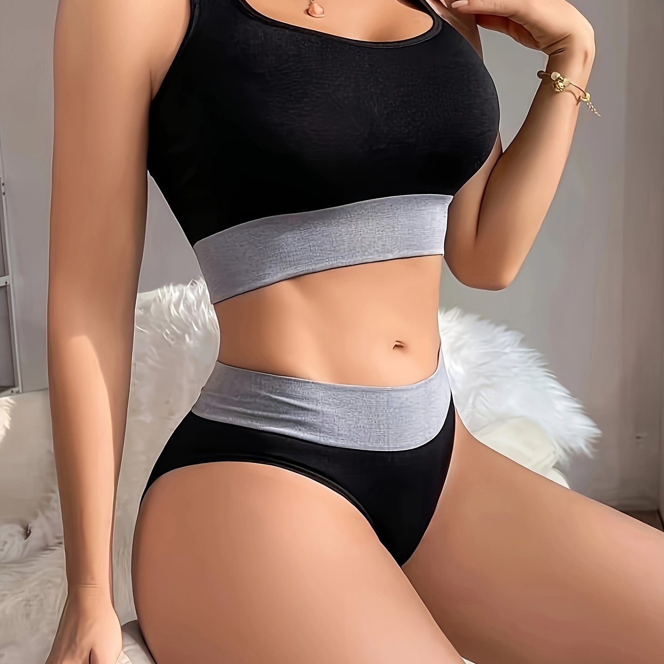 Colorblock seamless sports bra and panty set for women made of high support nylon-elastane blend that is non-see-through.