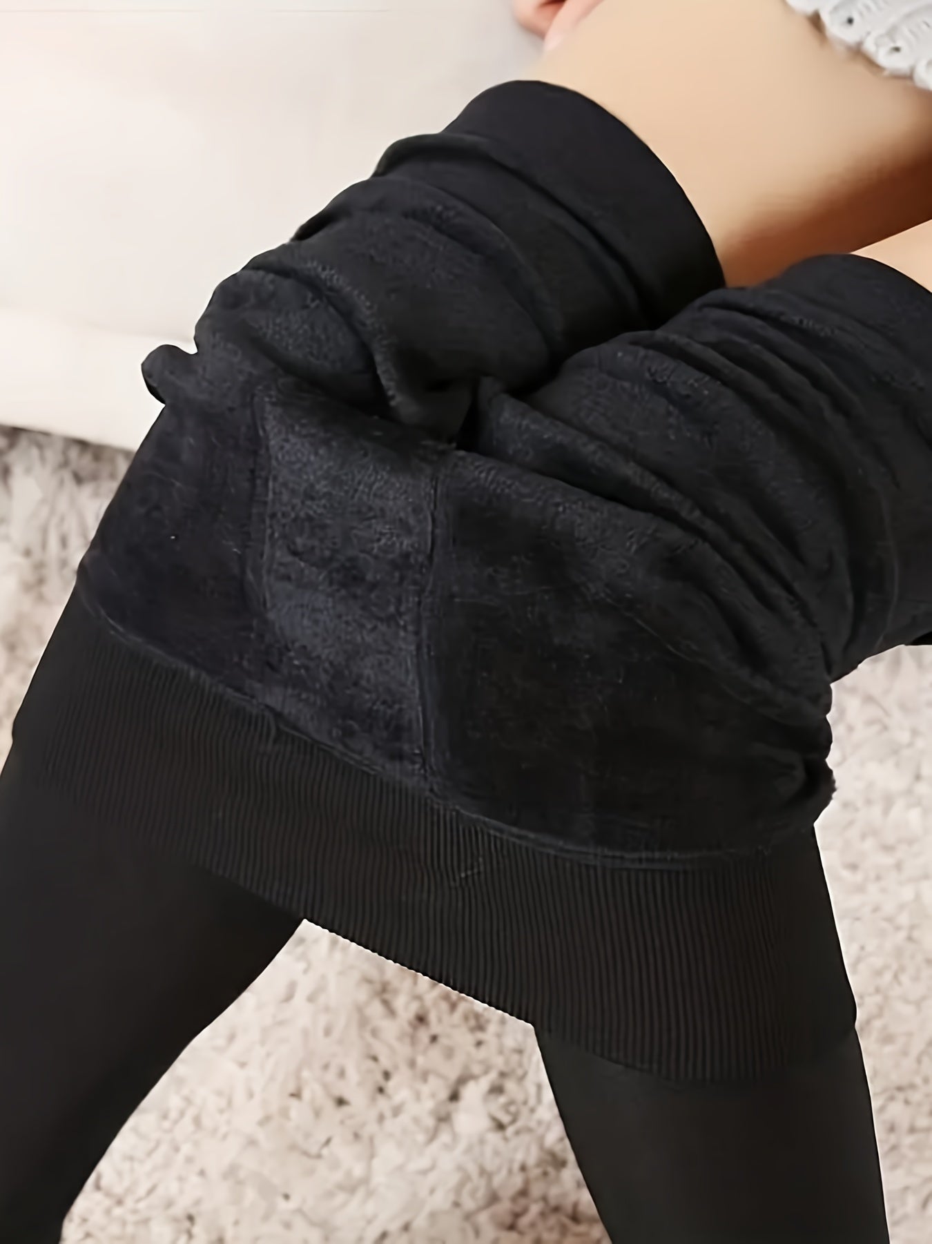 Cozy fleece-lined thermal leggings for women, perfect for cold weather, made of soft polyester/spandex blend; hand washable.