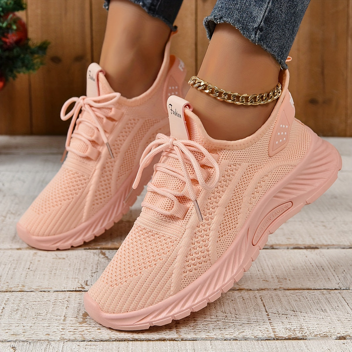 Trendy white knit fabric sneakers for women with EVA sole and breathable lace-up design, suitable for all seasons. Lightweight and stylish.