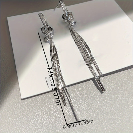 New for 2024, these unique sterling silver needle earrings feature long tassels for a light luxury look that is sure to elevate any outfit.