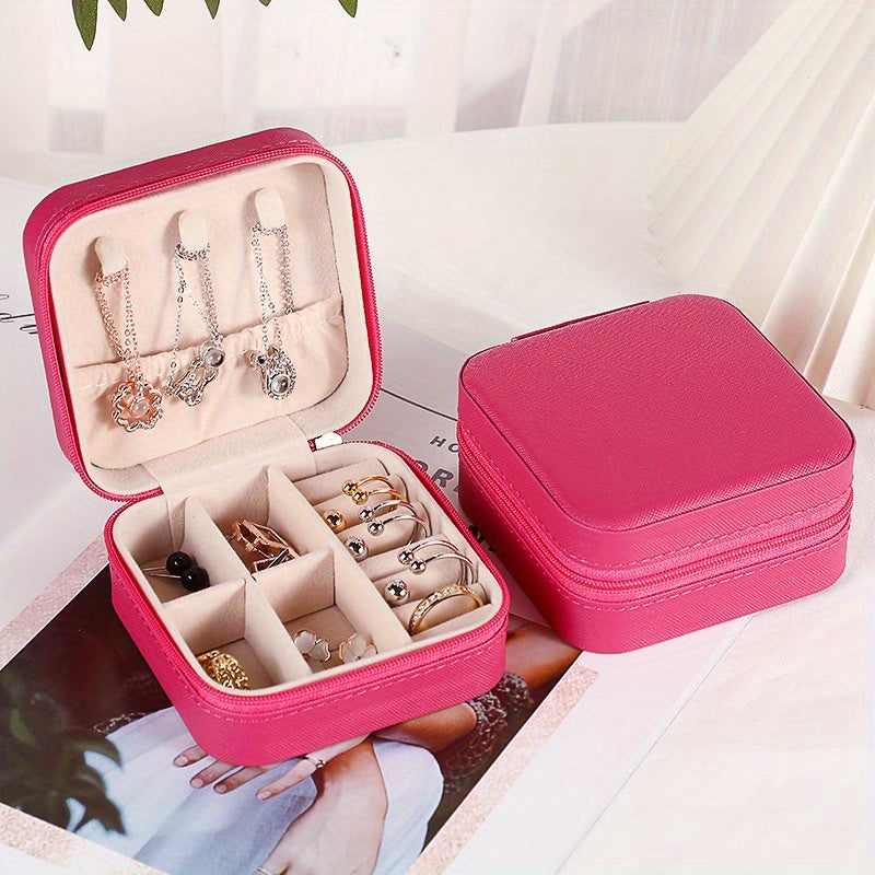 One stylish and portable jewelry box for earrings, rings, and necklaces.