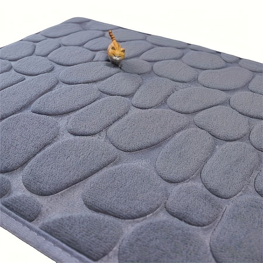 One piece of bath mat with embossed pebble pattern, highly absorbent and non-slip for bathroom use. Suitable for tub, toilet, and floor, made of machine washable polyester material. Dimensions are 59.94x39.88 cm.