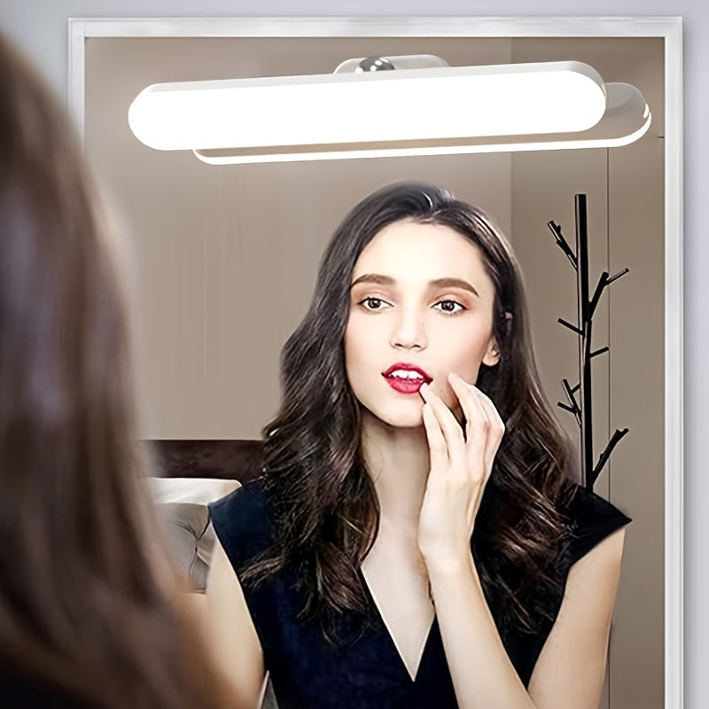 Modern LED vanity mirror lights with 360° rotation, touch-controlled brightness and angle, rechargeable battery, and USB cable. Perfect for makeup application in the bathroom or vanity area. Ideal vanity accessory.