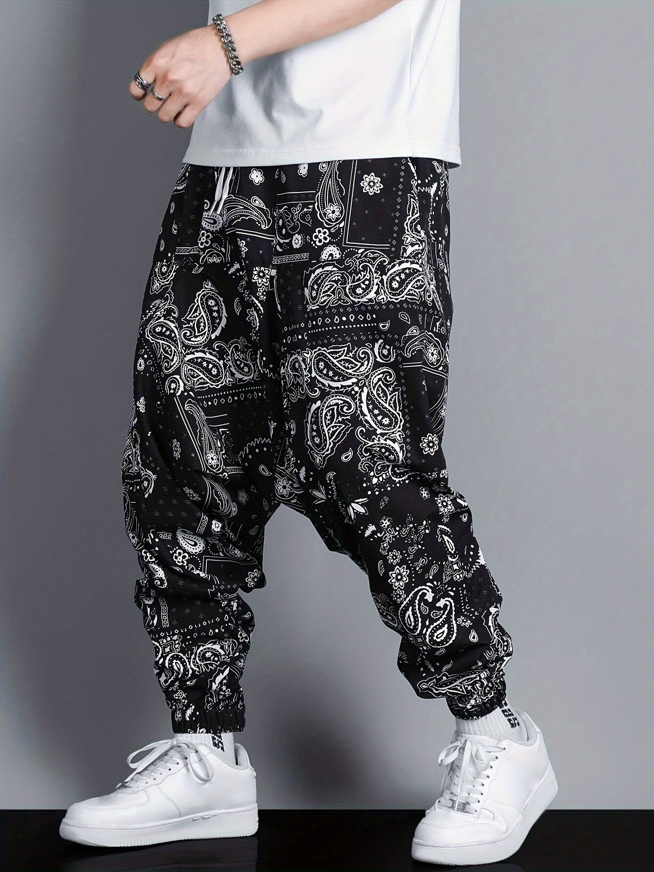 Men's oversized joggers featuring paisley pattern print.