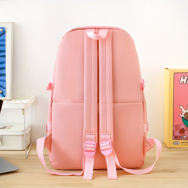 5-piece school bag set includes canvas backpack with plush bear, badge, coin purse, pencil case, handbag storage pouch, and crossbody bag for college. Cute style with stitching detail and