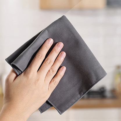 Magic Cloth Microfiber Wipes available in a 5-pack or 10-pack, featuring a sleek contemporary oblong shape. Made with non-woven fabric, these wipes are multi-functional with no water marks and excellent water absorption. Perfect for cleaning in the