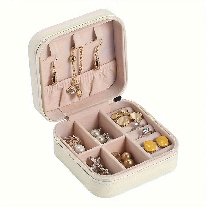 Waterproof PU jewelry organizer with zipper, perfect for traveling. Includes detachable dividers for rings, necklaces, watches, and earrings. Great gift for women for Christmas or Halloween. Ideal for jewelry storage.