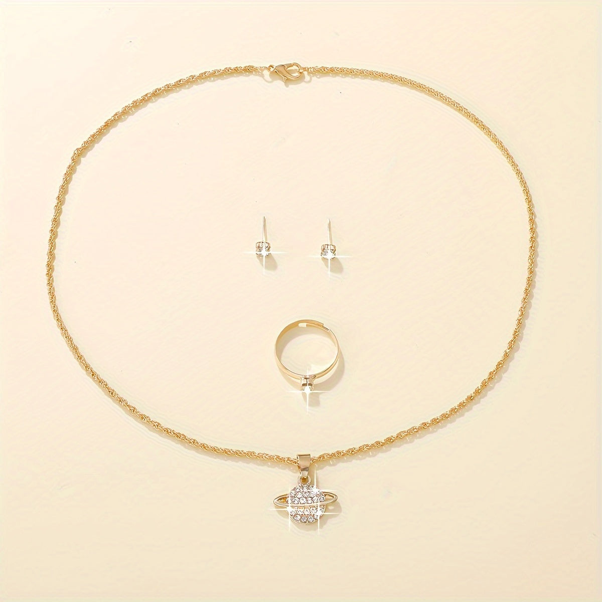 Stylish women's jewelry set includes planet pendant necklace, 2 stud earrings, and 1 ring for daily or vacation wear.