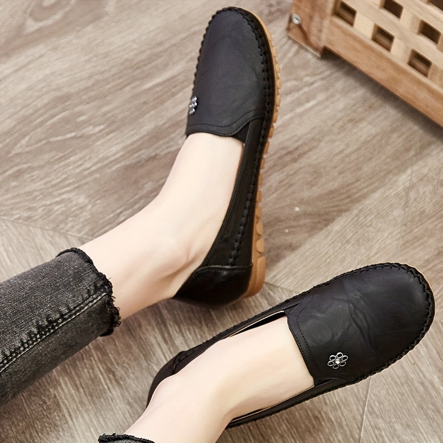 Stylish, comfortable women's loafers with flower buckle detail and soft sole for daily wear.