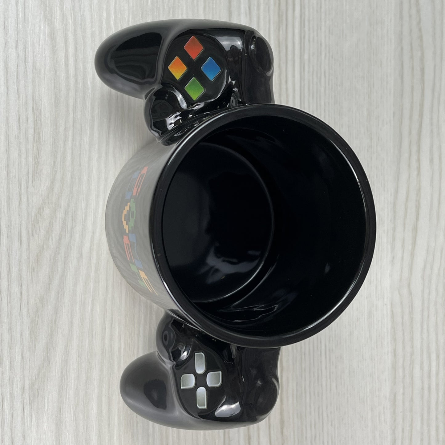 Colorful Game Controller Coffee Cup, ideal for gamers and collectors.