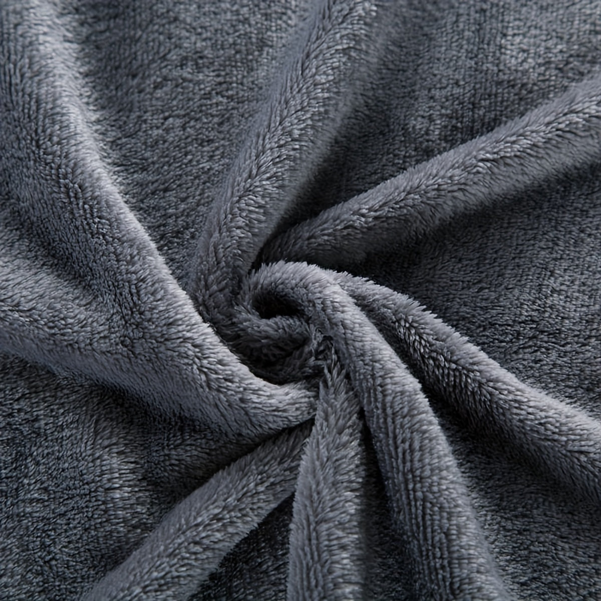 A cozy, grey flannel blanket is the perfect gift for any occasion. This soft and warm throw blanket is ideal for snuggling up on the sofa, staying warm in the office, or keeping cozy on a camping trip. It's a versatile gift that can be used all year