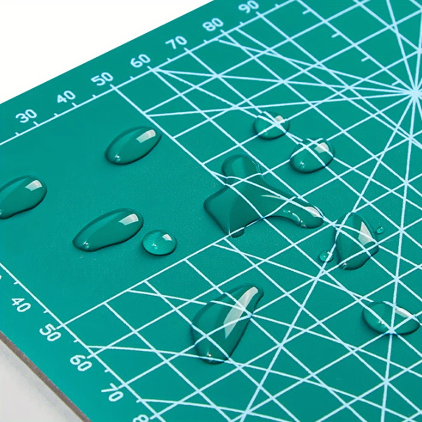 Durable A3 cutting mat for quilting and sewing, featuring a high-precision non-slip surface for fabric, paper, and crafting projects. Ideal for crafters and hobbyists.