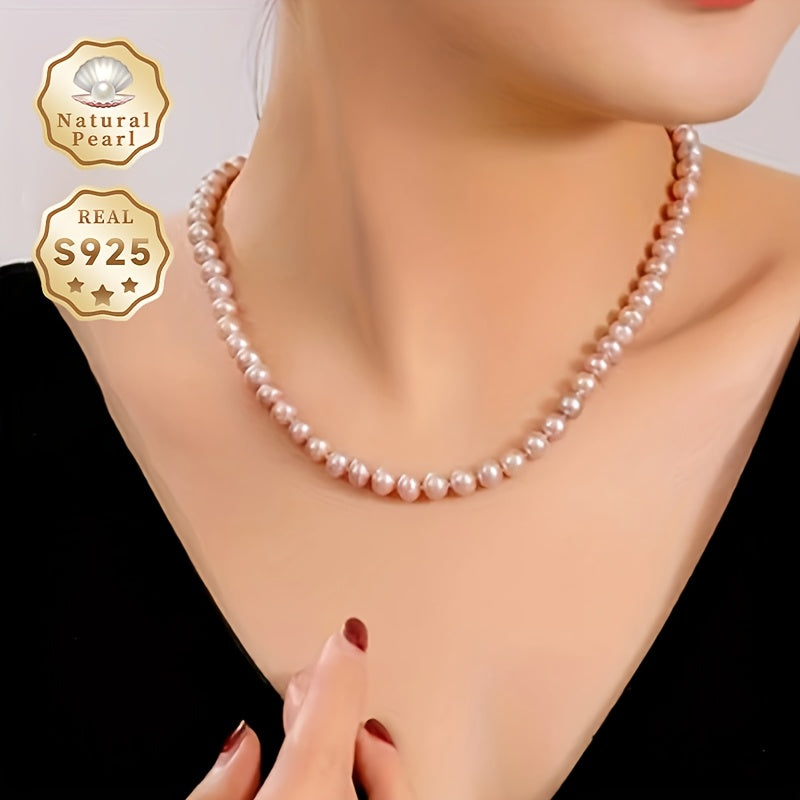 This luxurious and elegant freshwater pearl necklace is designed for women with a June birthstone. It features a S925 silver clasp and a 7-7.5mm strand of purple natural pearls. The necklace comes in a gift box and is perfect for daily wear or special