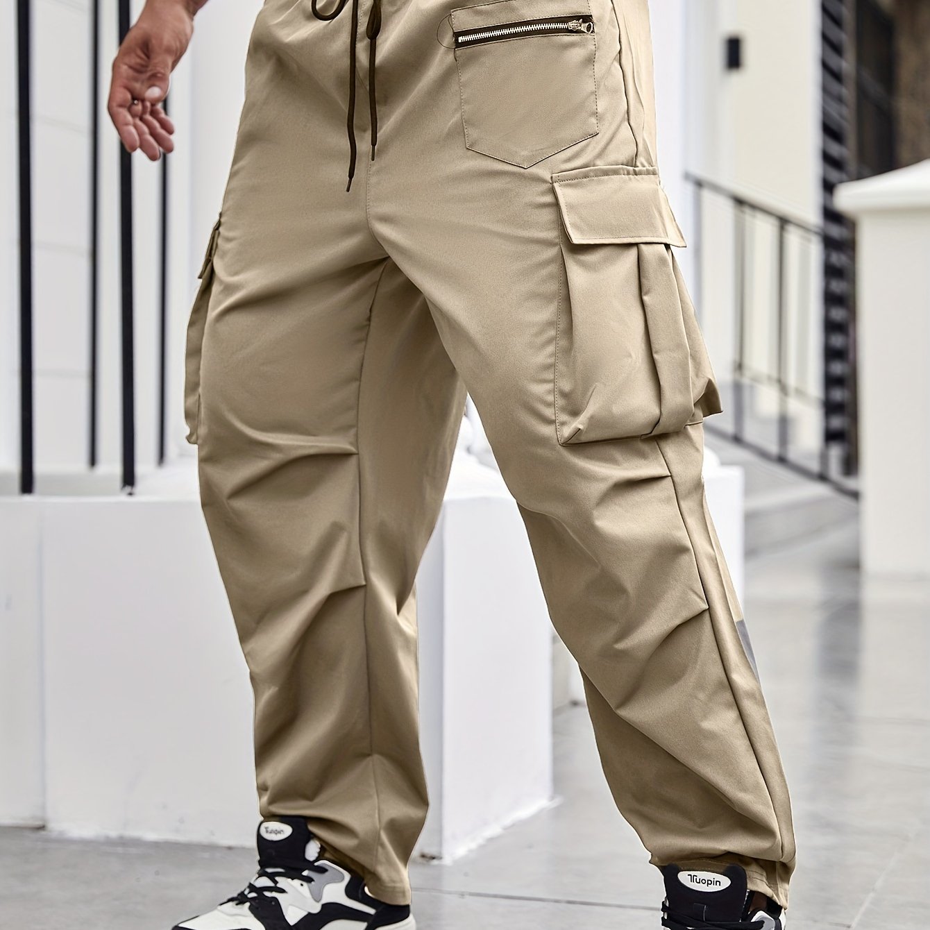 Durable polyester cargo pants for men in plus sizes, suitable for all seasons.