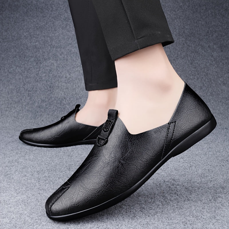 Sleek black slip-on shoes for men, breathable and fashionable with a durable sole.