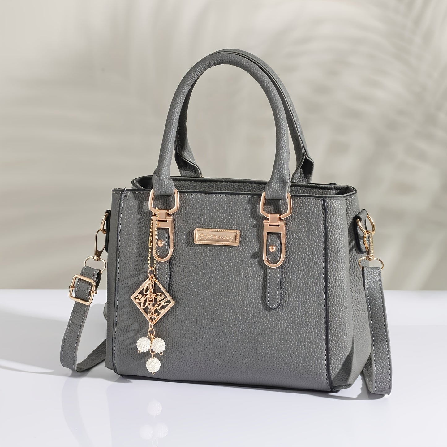 Pick from 7 colors. Stylish black handbag with lychee pattern tote. Spacious, multifunctional, adjustable shoulder strap, zipper closure. Ideal for daily commuting. Light luxury style, can