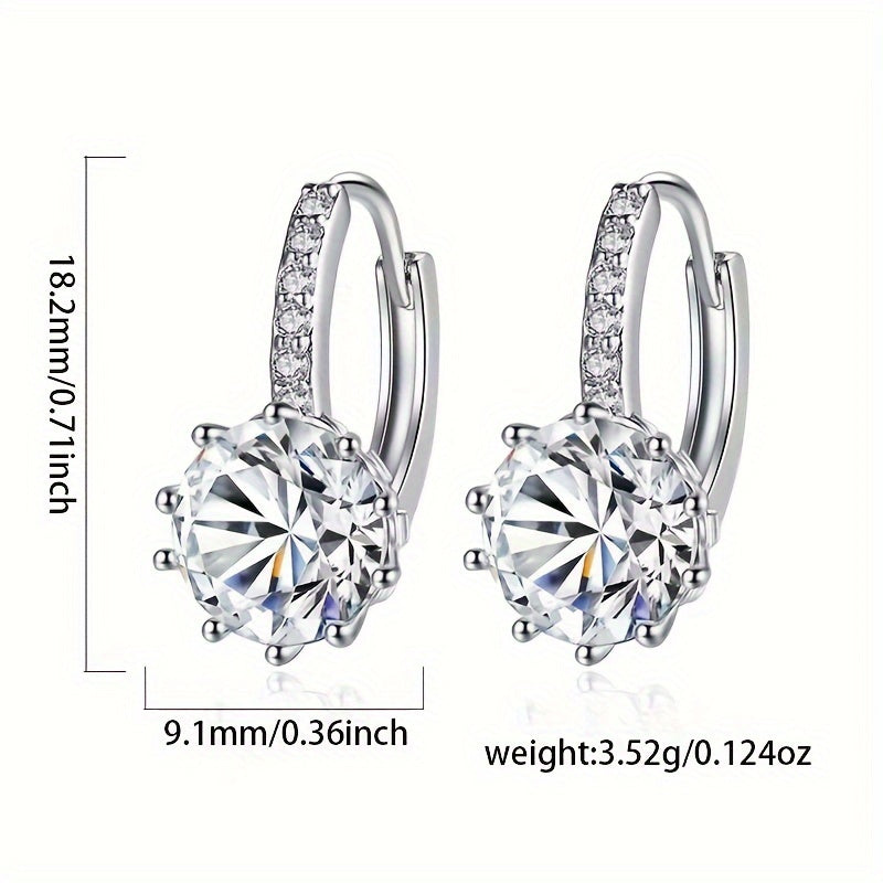 These stunning round zirconia earrings are crafted from hypoallergenic S925 silver, making them perfect for women with sensitive skin. They make a beautiful Valentine's Day engagement gift, weighing in at 3.52g (0.124oz).