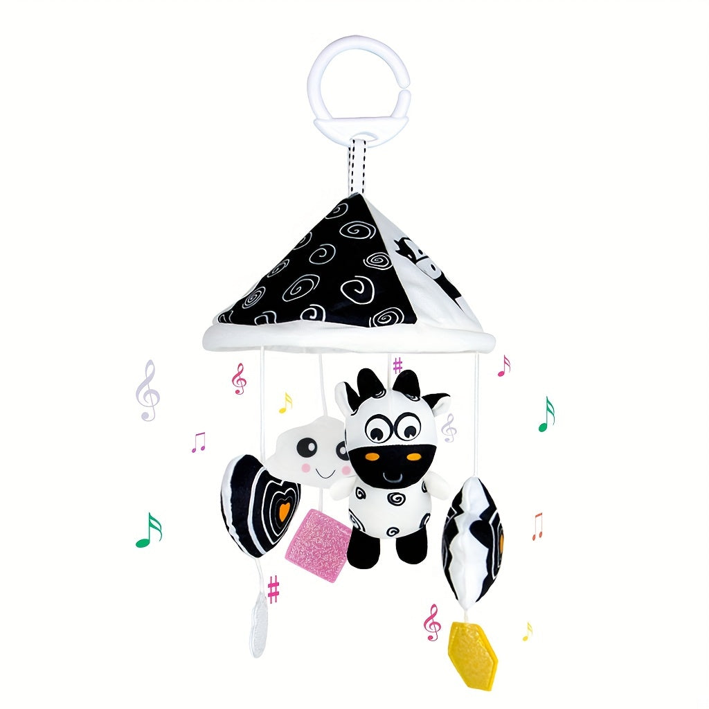 Baby toy car in black and white hanging from the baby trolley, with an umbrella wind chime for early education. The crib bell and stroller hanging umbrella bed bell pendant features black and white animal wind chimes. Additionally, there is a bed hanging