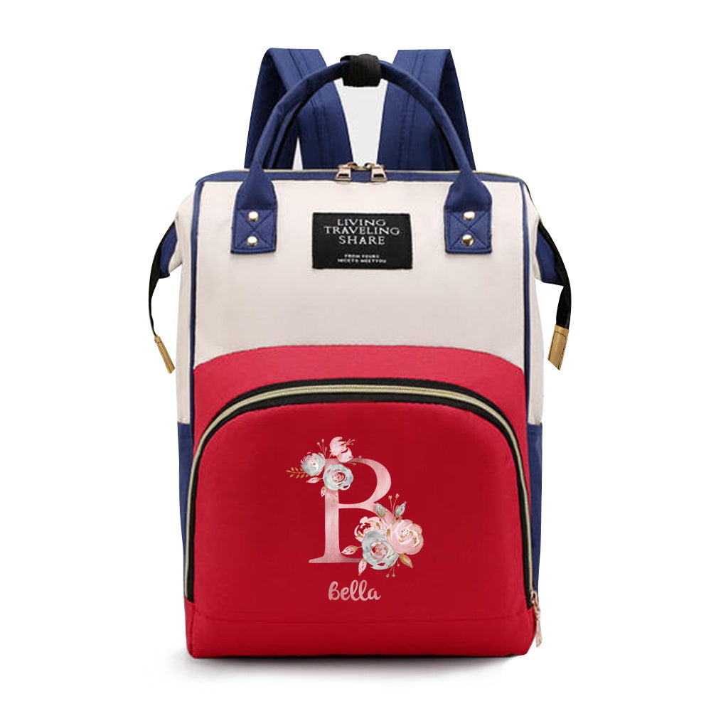 Personalized Mommy Backpack made of durable Oxford cloth with ample storage space for diapers and other essentials. Features customizable initials and name, as well as convenient bottle pockets. Perfect for nursing mothers on-the-go, with options for A-Z