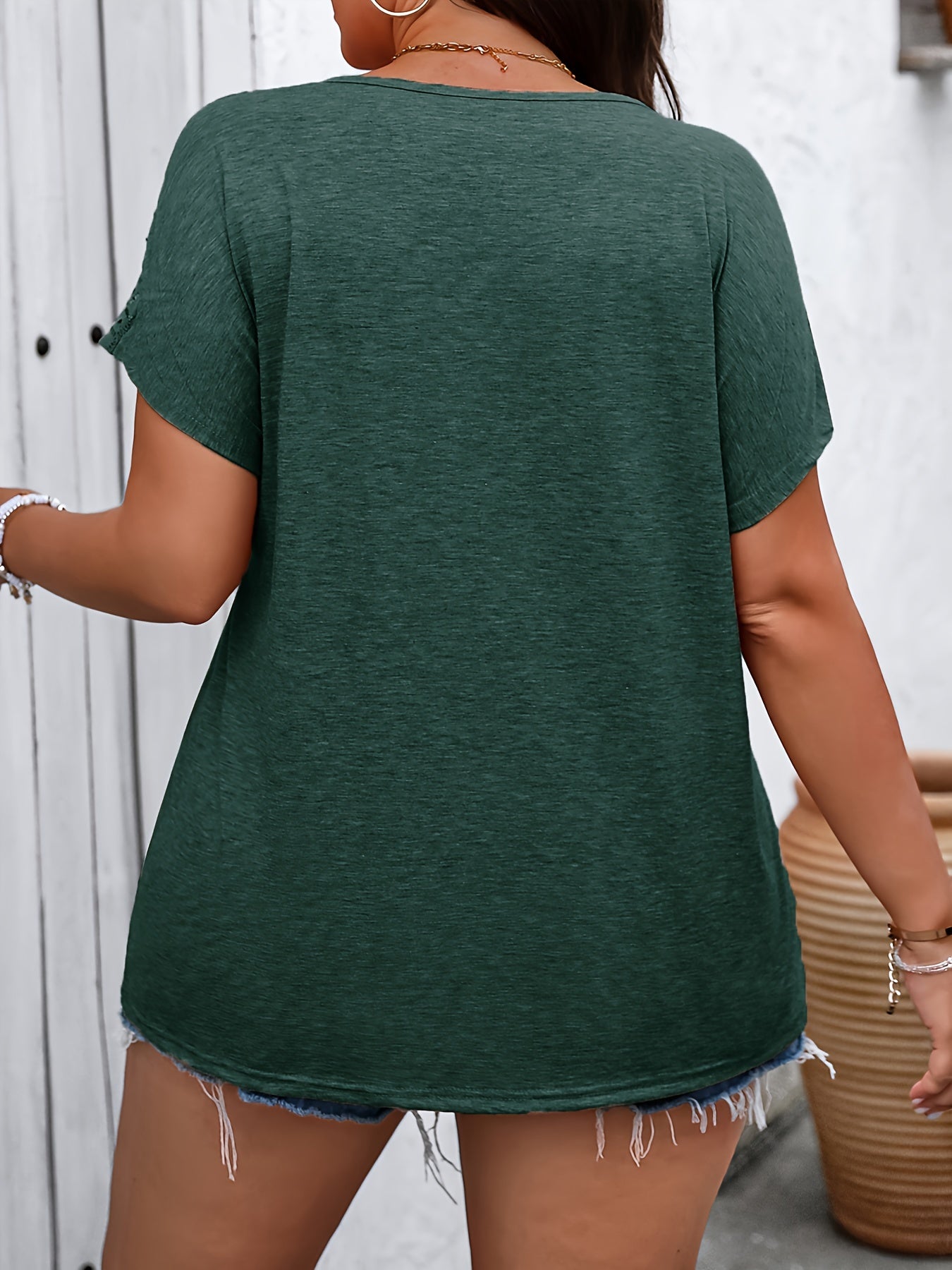 Plus size V-neck t-shirt with cut-out sleeves, perfect for spring & summer. Women's casual clothing in plus sizes.