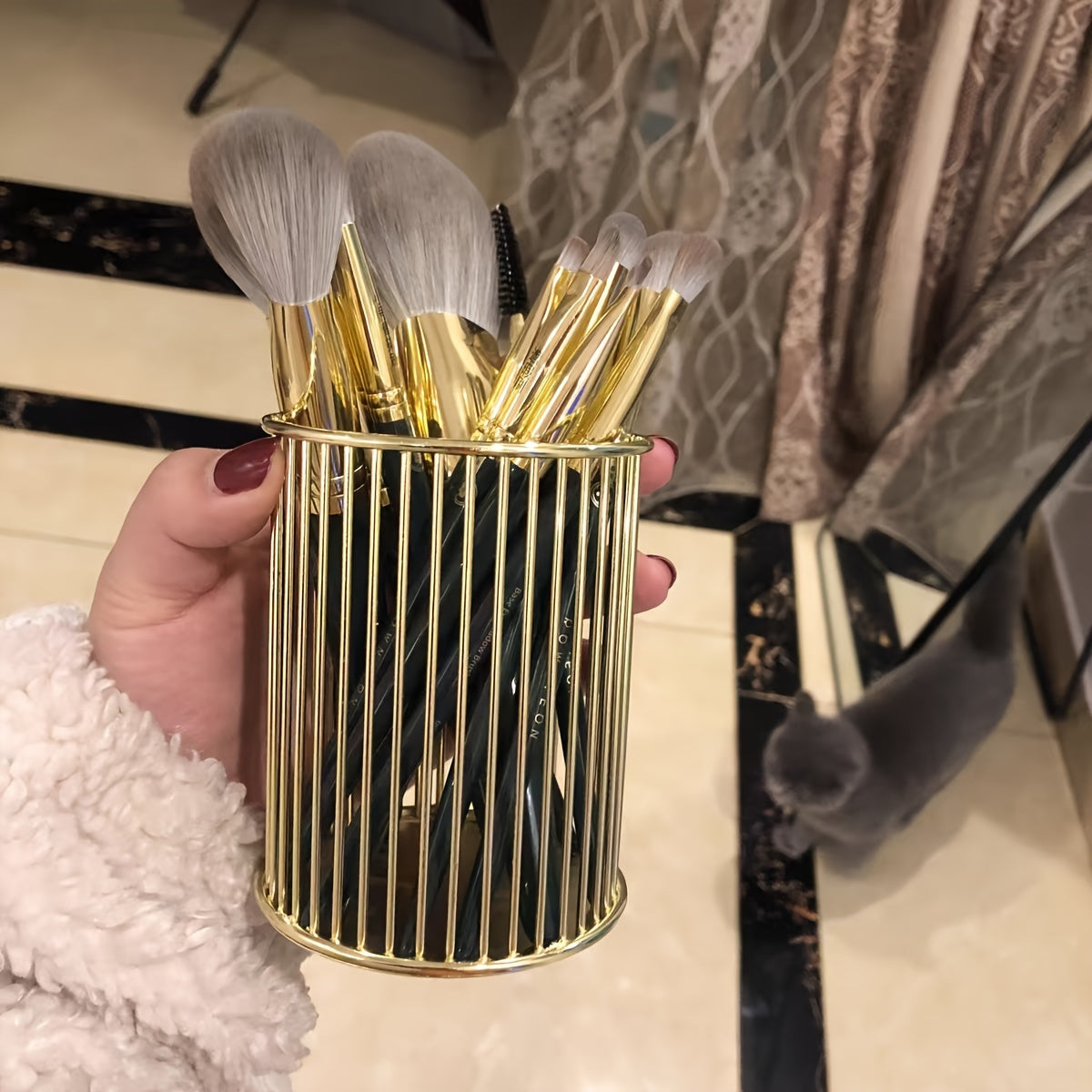 Stylish metal pen holders for makeup brushes, office supplies, and vanity storage.