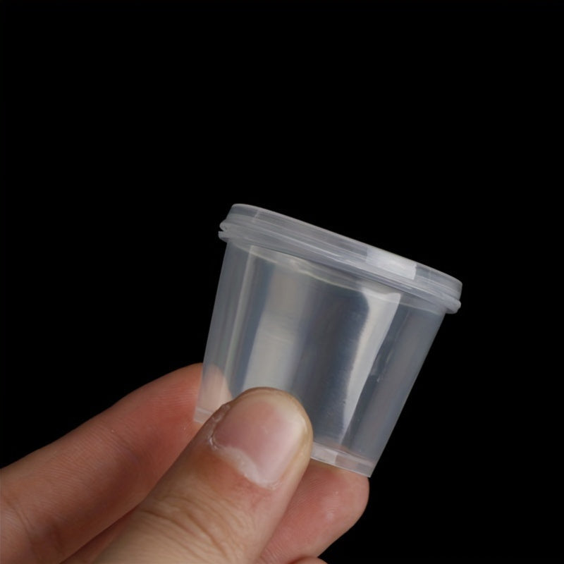 100 pieces of plastic disposable sauce containers with lids - small, clear food storage cups for condiments, snacks, dressings. These containers are BPA-free and food-safe, perfect for takeout meals.