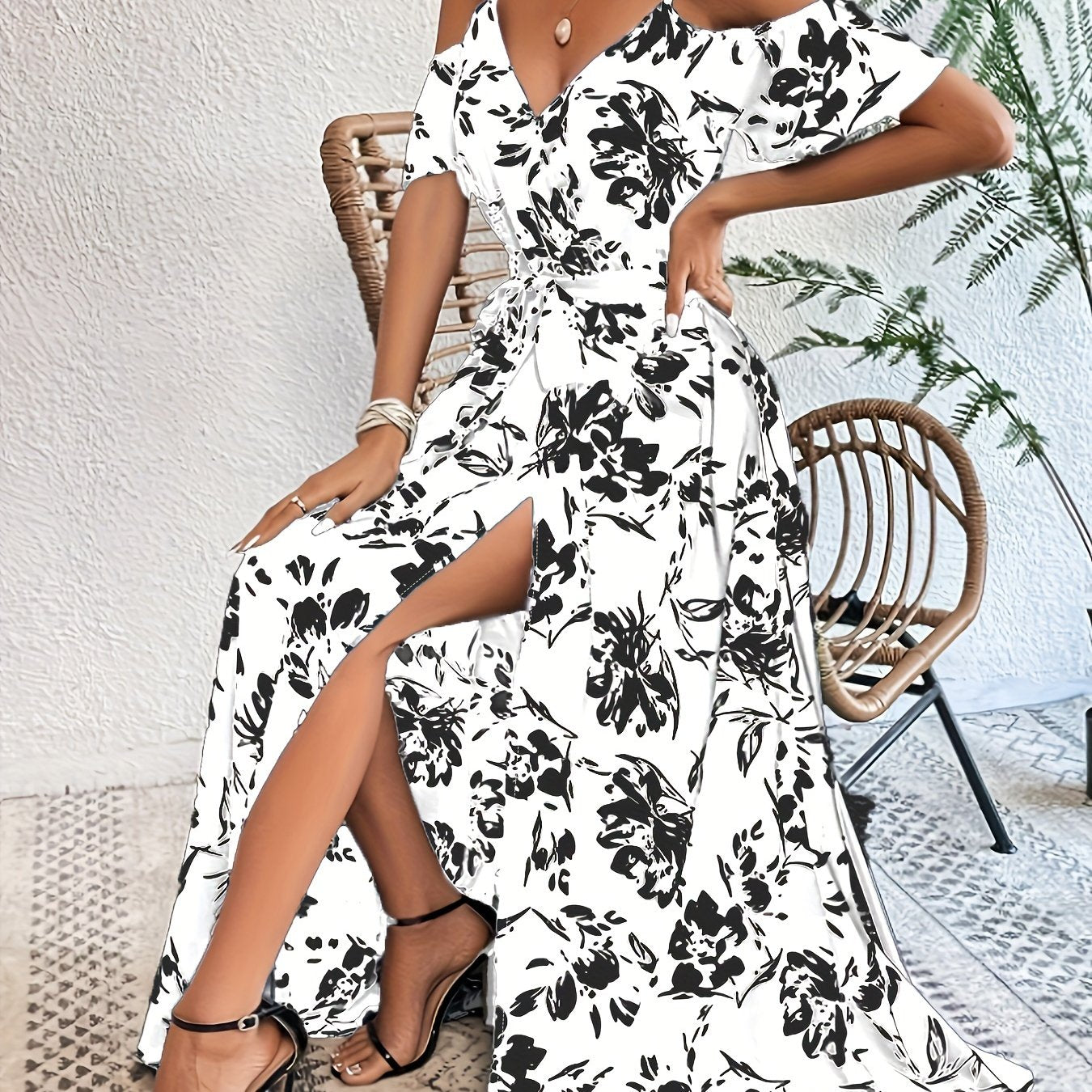 Belted cold shoulder dress with floral print, perfect for spring and summer.