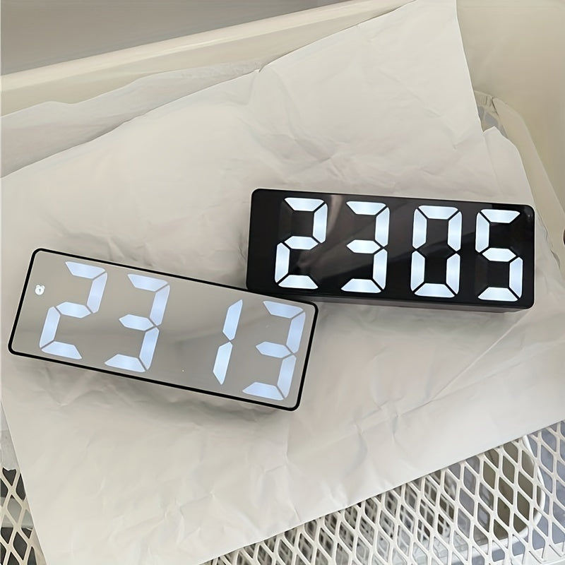 Digital clock with large LED display, mirror surface, dual brightness levels, and battery or USB charging, ideal for home décor.