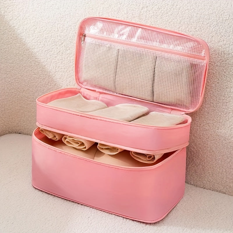 Travel underwear and bra organizer bag with double-layer design and divided compartments. Made of beige polyester fabric with a mesh interior. Ideal for dorms, trips, and daily use. Hand