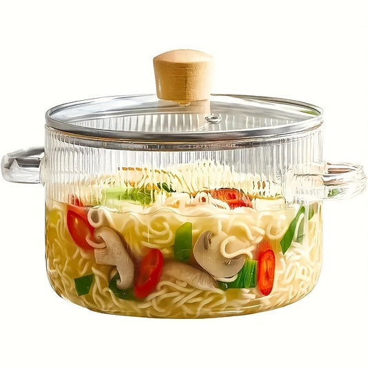 Glass cooking pot with a lid, perfect for stove top cooking. Made from heat-resistant borosilicate glass, this 1.6 liter (54 oz) pot is ideal for simmering soups, heating milk, and preparing food supplements. A versatile addition to any kitchen, this