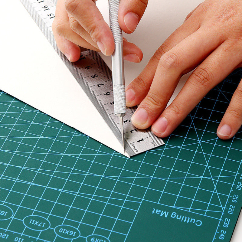 Durable A3 cutting mat for quilting and sewing, featuring a high-precision non-slip surface for fabric, paper, and crafting projects. Ideal for crafters and hobbyists.