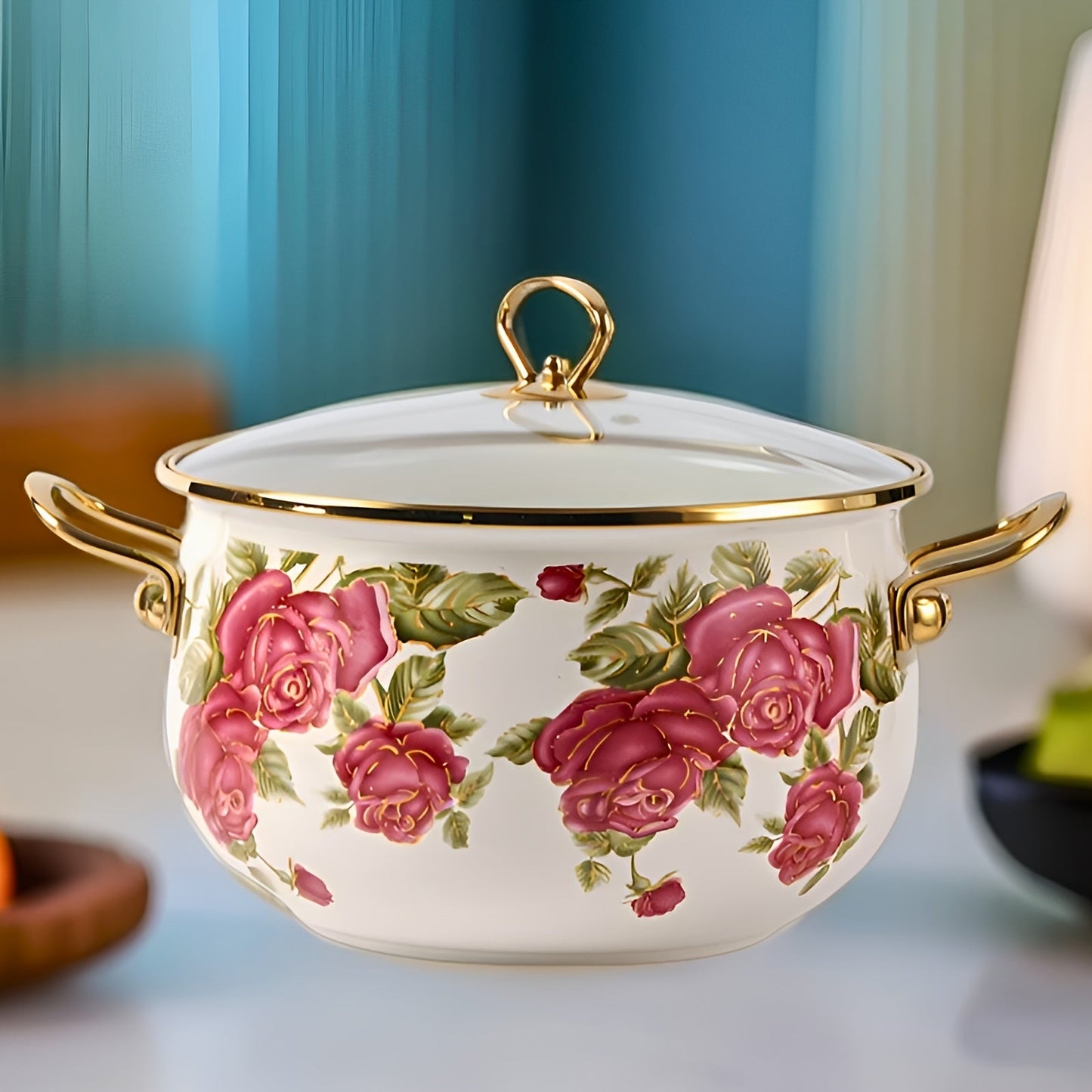 Luxurious stockpot with gold handle and lovely rose flower enamel design. Comes with a durable glass lid and is offered in four different sizes. Perfect for high-end cooking in your home or outdoor kitchen.