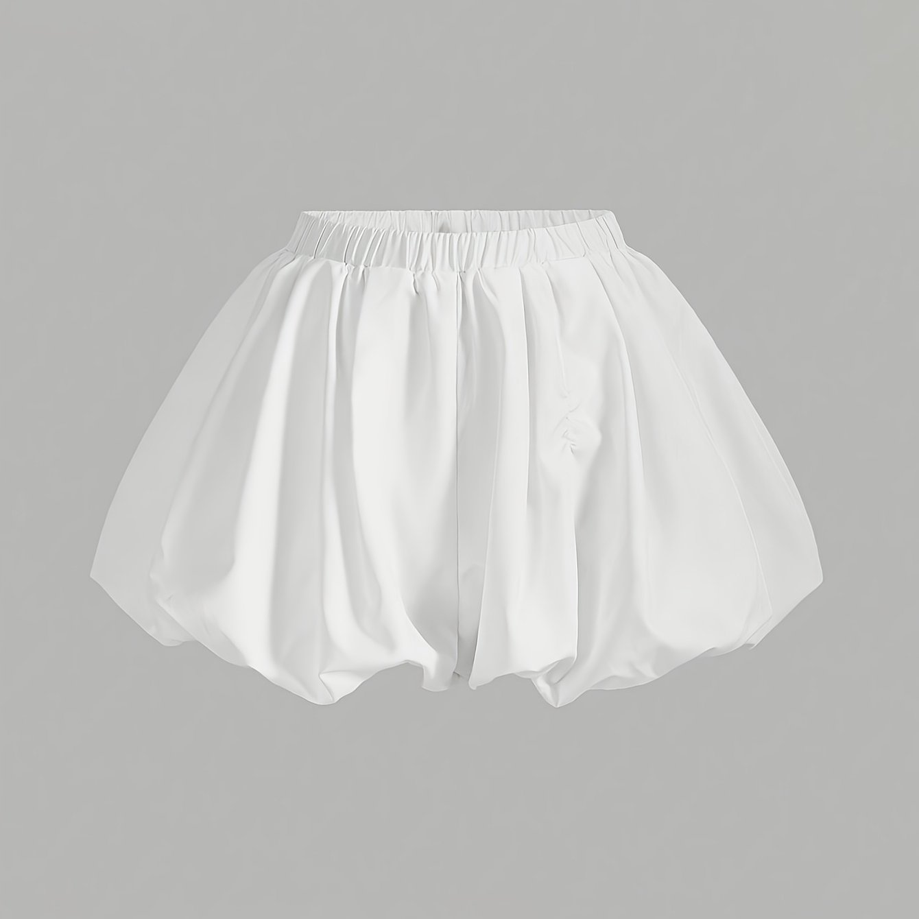 Double-layer high-waisted shorts with lining and lantern shape in solid color.