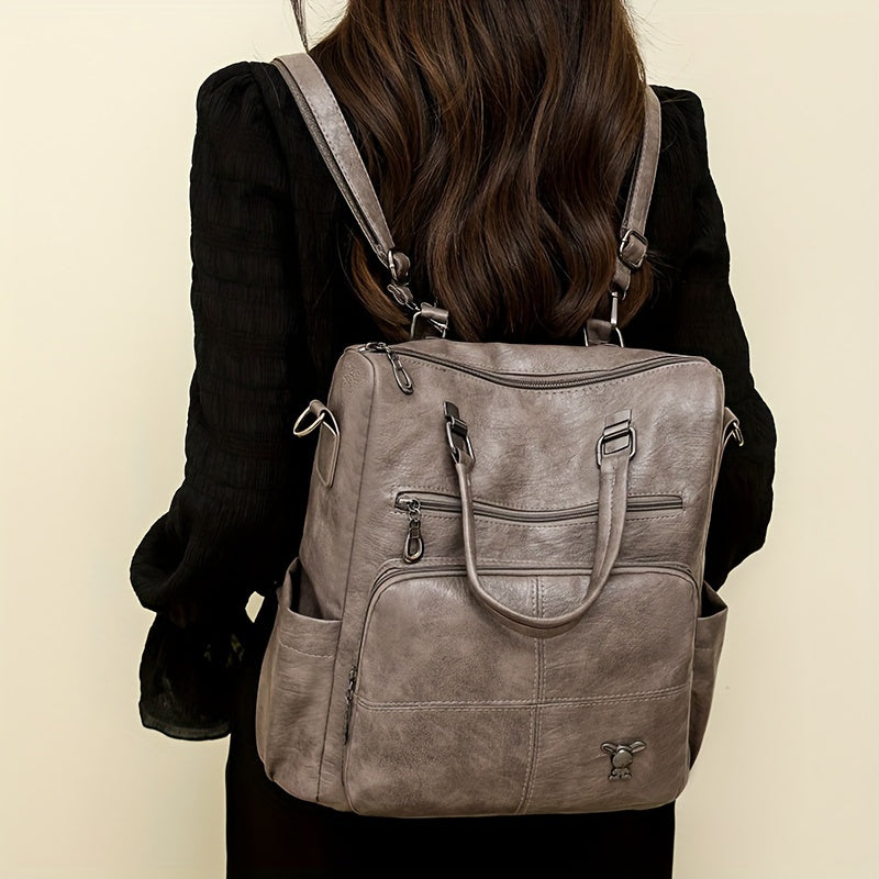 Chic faux leather backpack with removable strap, versatile shoulder bag in multiple colors.