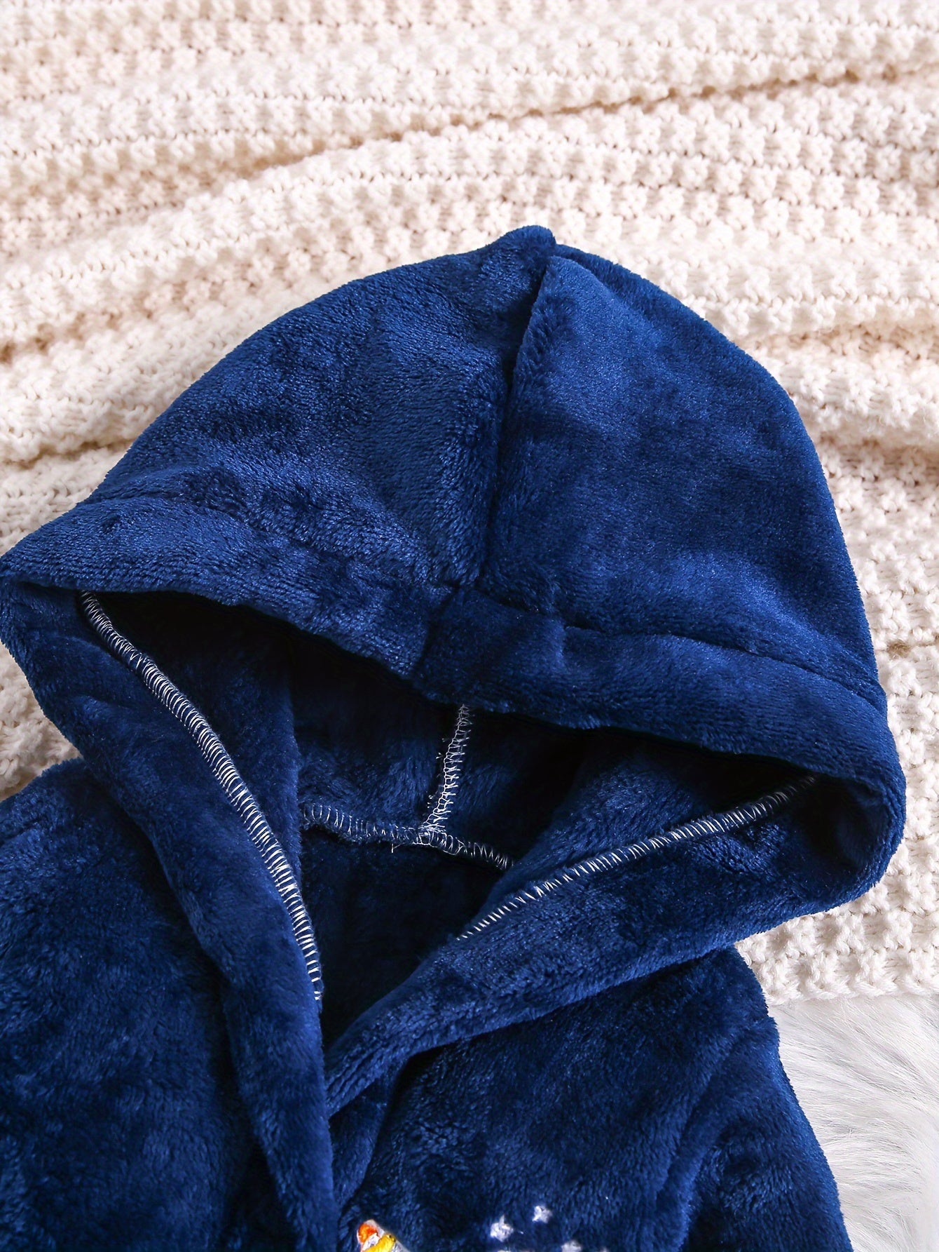 Blue flannel hooded bathrobe with rocket embroidery - cozy, thick, and machine washable for kids