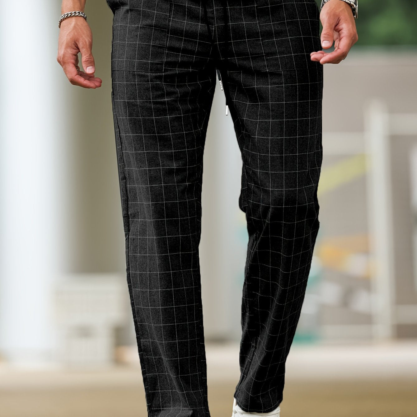 Men's polyester pants with drawstring waist, ideal for spring and fall, featuring casual striped plaid pattern.