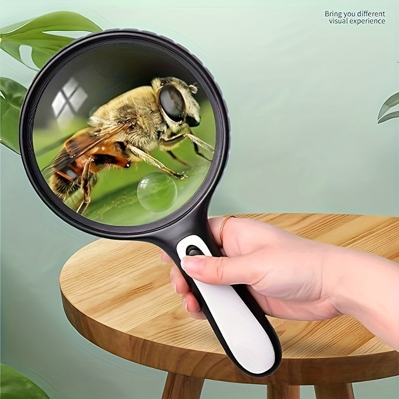 LED-Lit handheld magnifying glass with high power (30X/60X) ideal for seniors, youngsters, and low vision readers.