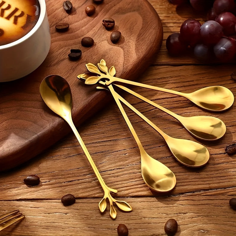 Golden stainless steel spoon set with leaf accents, polished finish, dishwasher safe, ideal for stirring, fruit, appetizers. Perfect for home, parties, weddings, holidays. Elegant and nature-inspired tableware.