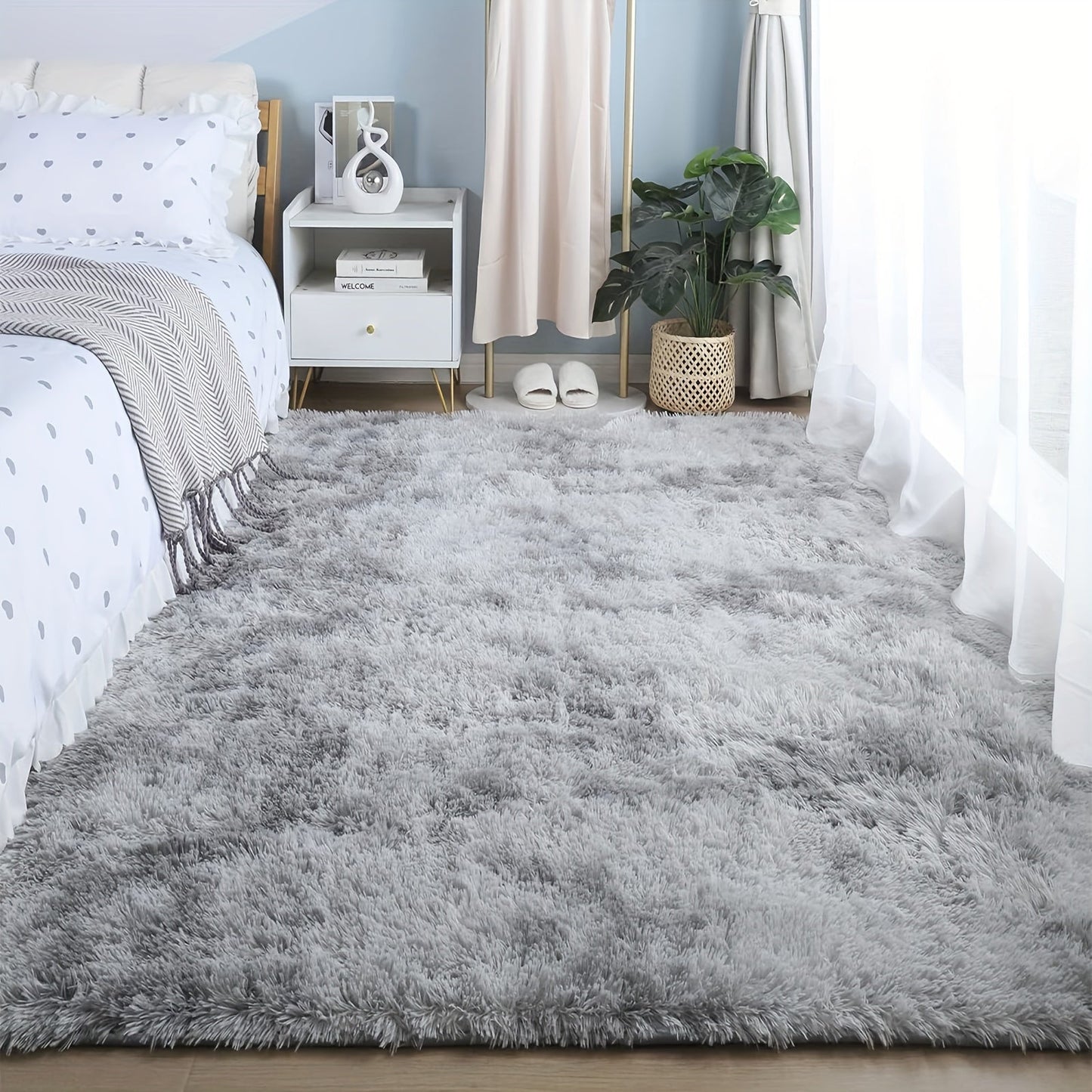 Luxurious soft plush shag area rug perfect for the living room, fluffy shaggy floor carpet ideal for the bedroom. This home decor piece adds warmth and style to any space. Non-slip and machine washable, it's perfect for the living room, bedroom, game