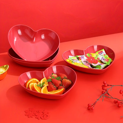 Heart-shaped plastic plates for weddings in sets of 4 or 8. Decorative red serving dishes for snacks, salads, and candy. Versatile party platters for all seasons.