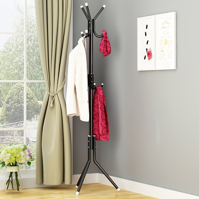 Modern freestanding clothes rack made of wrought iron in black, light blue, and pink. This space-saving design includes hooks for coats, hats, and towels. Easy to assemble and perfect for organizing garments in the bedroom or living room. Can be used for