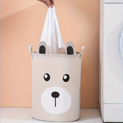 A fun and functional hamper featuring a cartoon pattern, made of linen fabric with cute ears design. Perfect for organizing and storing clothes, toys, and other items. Ideal for use in the bathroom, bedroom, living room, or laundry room.